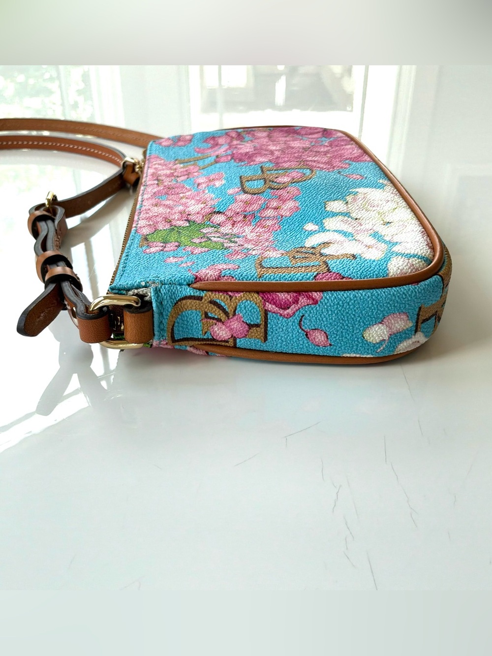 Dooney & Bourke Hydrangea Basketweave Crossbody Pouchette in Sky Blue. K0892215 - Picture 4 of 10